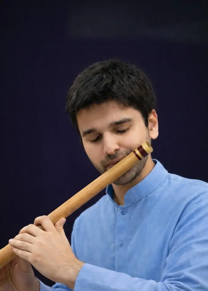 Meditative portrait playing bansuri