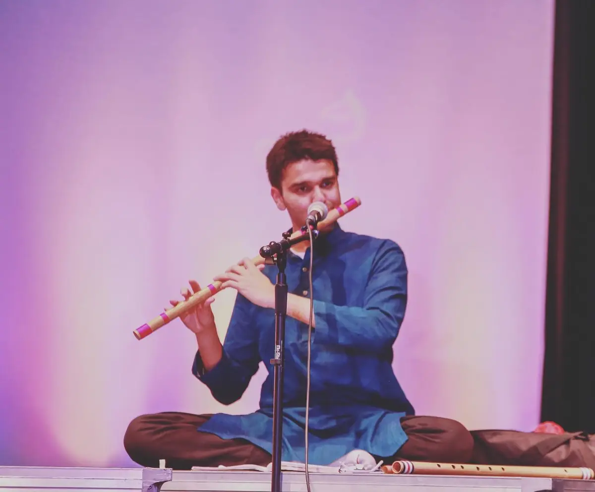 Stage performance with purple lighting